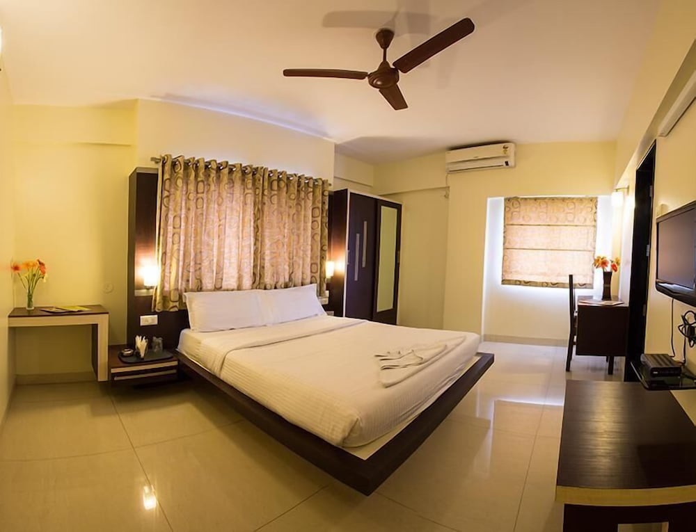 Фото Amrita Executive Hotel