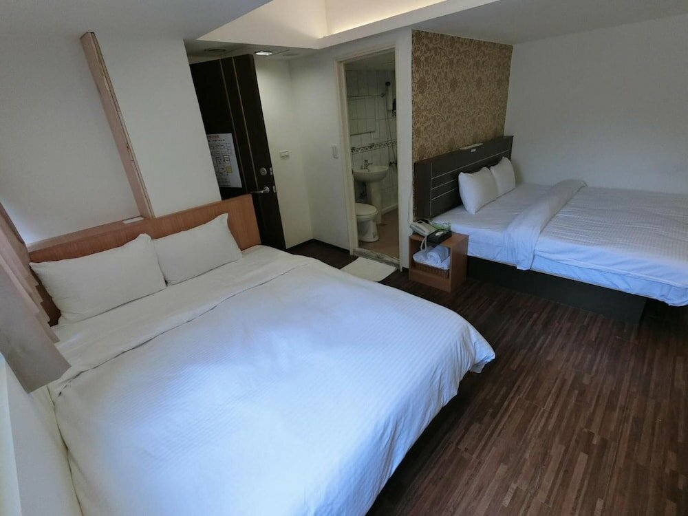 Фото Jhong-Sing Hotel