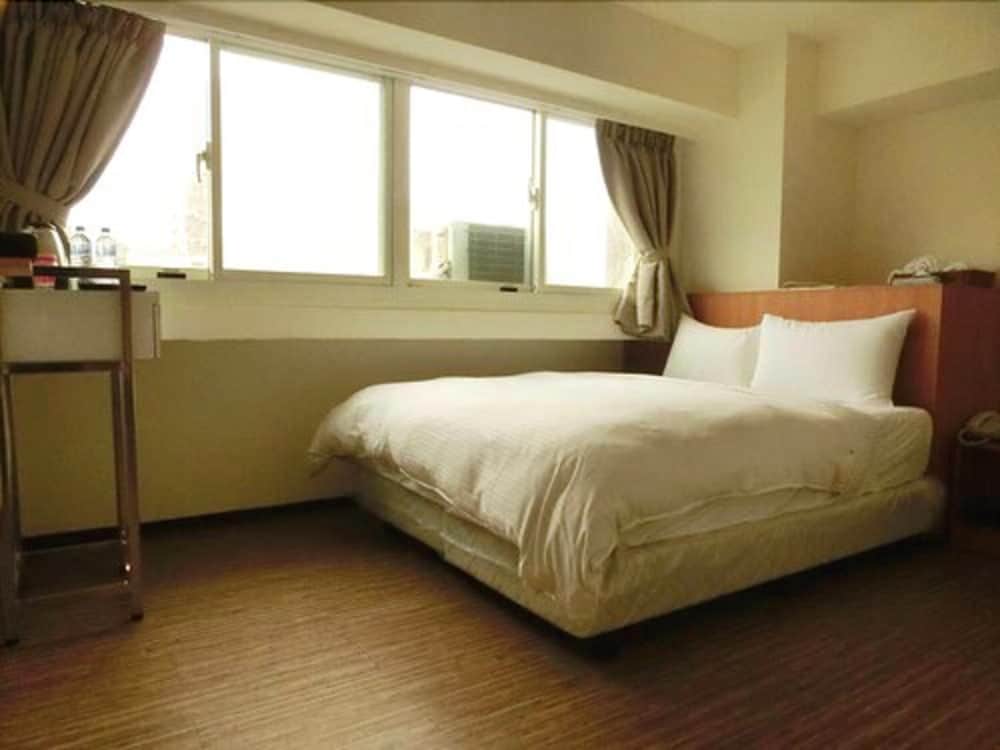 Фото Jhong-Sing Hotel