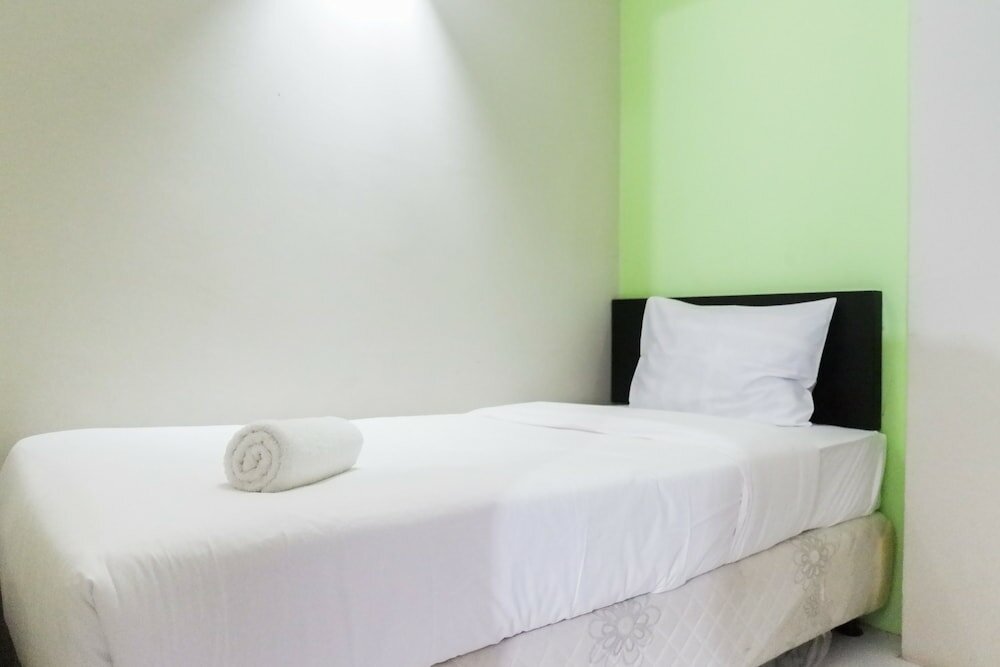 Фото Minimalist 2br at Dian Regency by Travelio