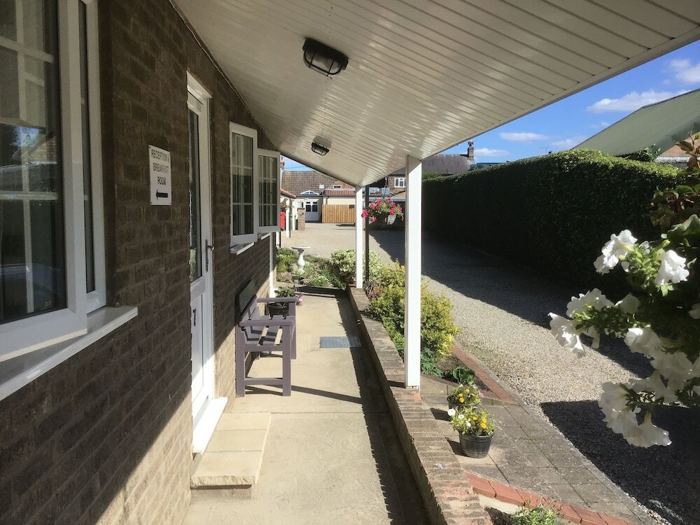 Фото The New Inn Motel