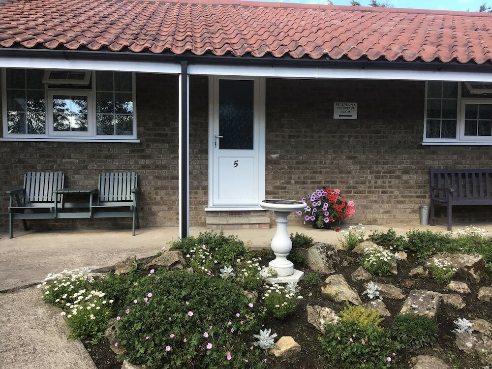 Фото The New Inn Motel