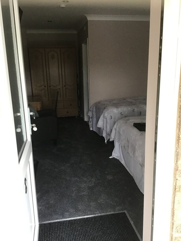 Фото The New Inn Motel