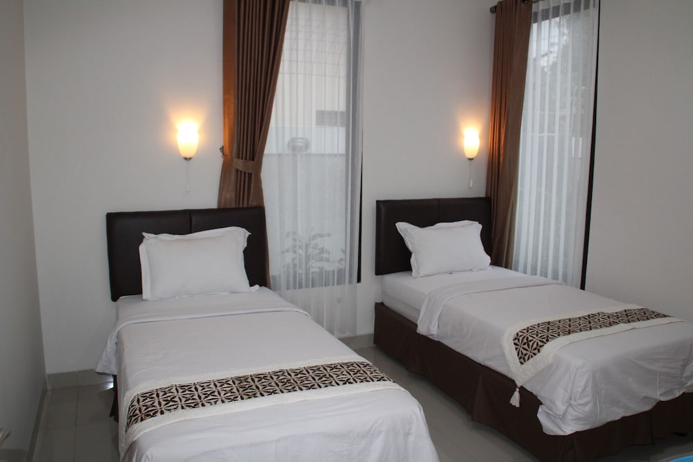 Фото Natura Rumah Singgah Guest House