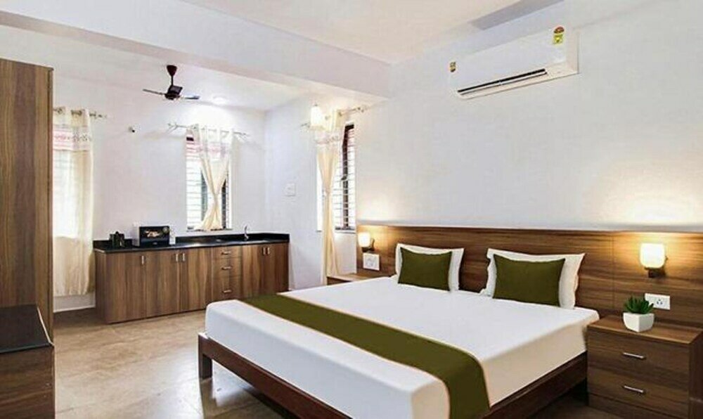 Фото Fabexpress Holiday Suites