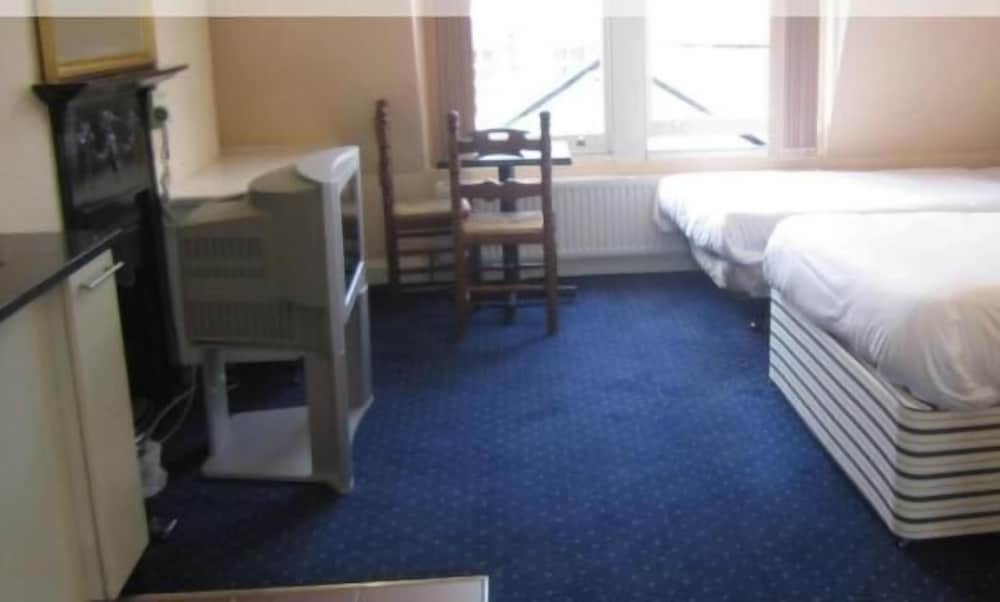 Фото Mermaid Suite Hotel