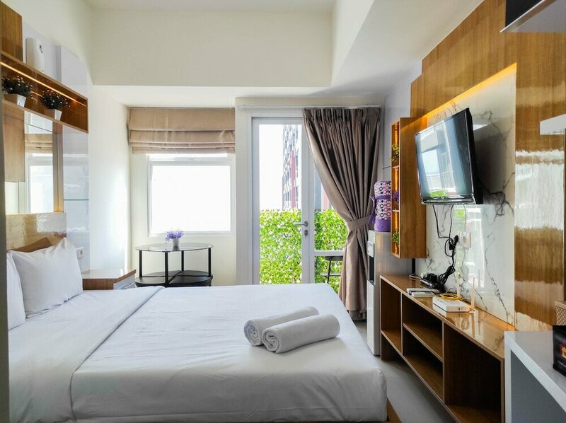 Гостиница Modern and Elegant 2br at Vida View Apartment by Travelio в Макасаре