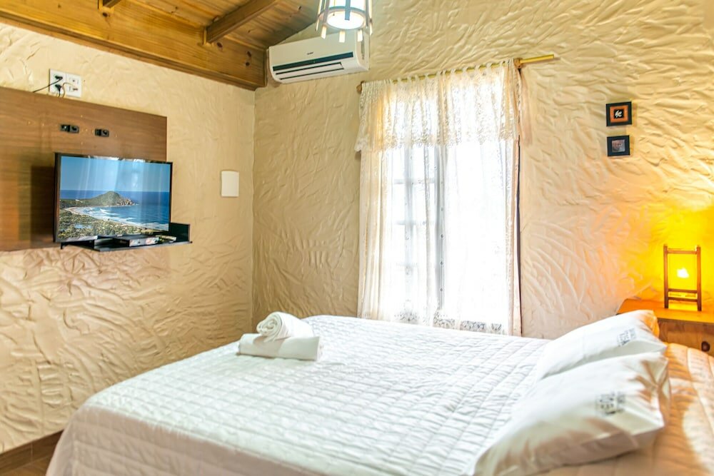 Фото Pousada Bangalôs do Rosa