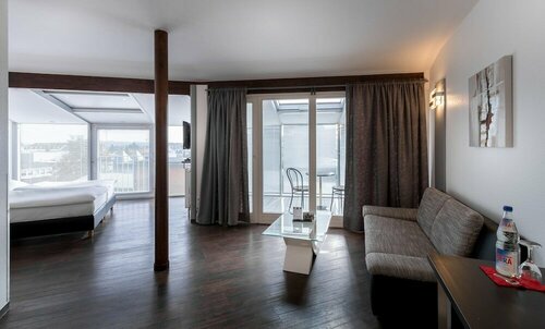 Гостиница Turmhotel Rhein Main в Лангене