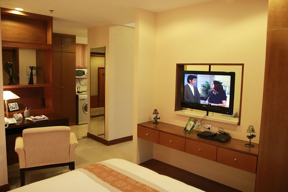 Фото Dalian Asia Pacific Service Apartment