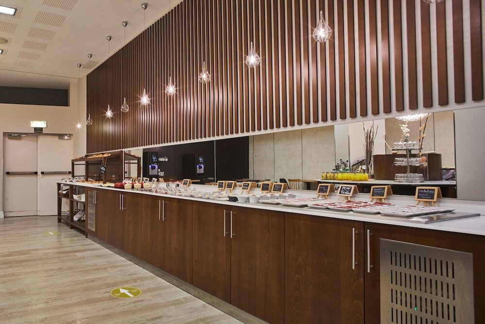 Фото Hotel Silken Ciudad Gijon