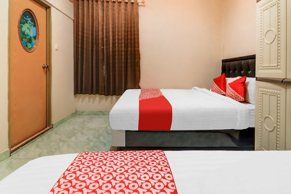 Фото Oyo 91021 Steze Kost & Guest House