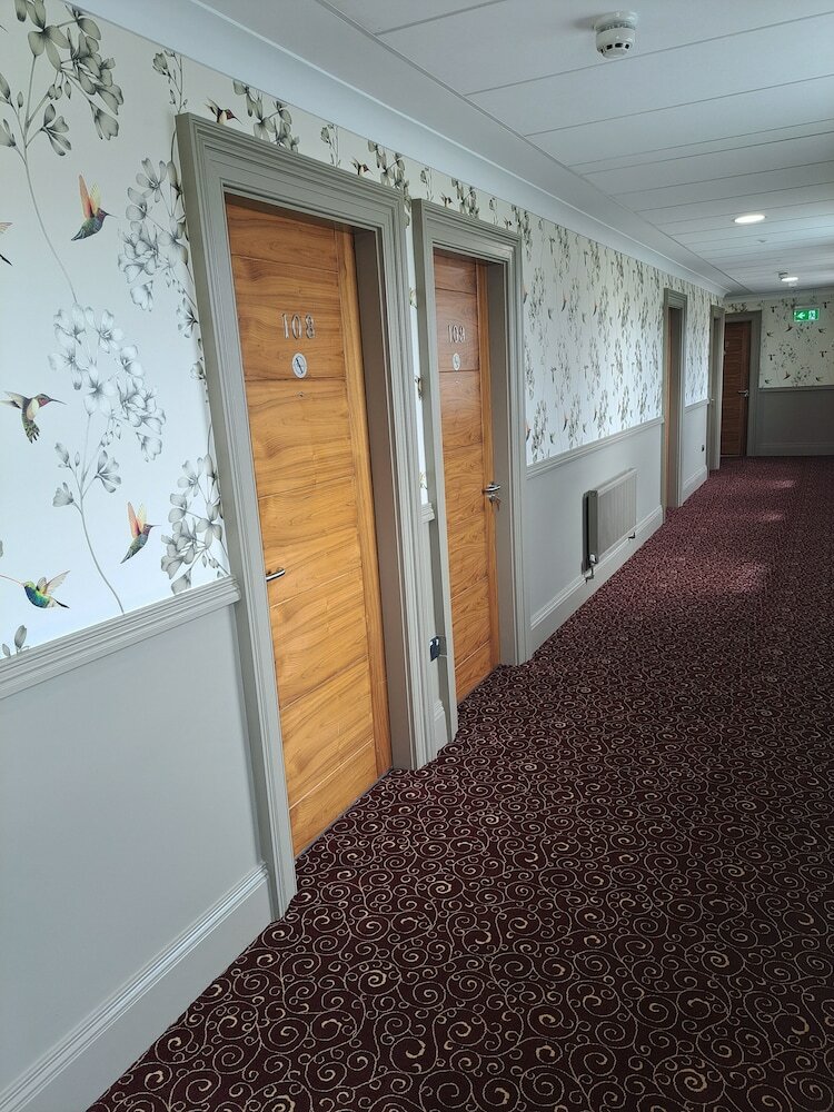 Фото Coachmans Inn