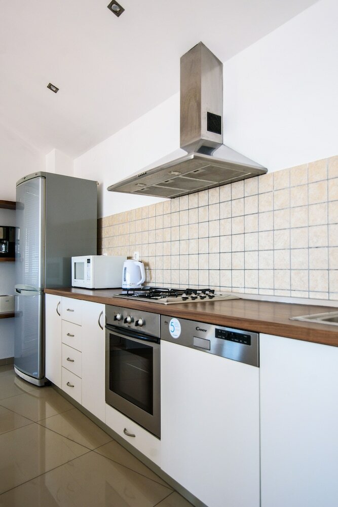 Фото Zenith Apartment by DuHomes