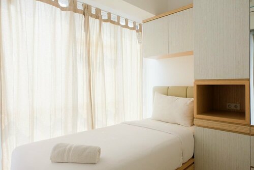 Гостиница Comfy 2br at M-Town Residence Apartment