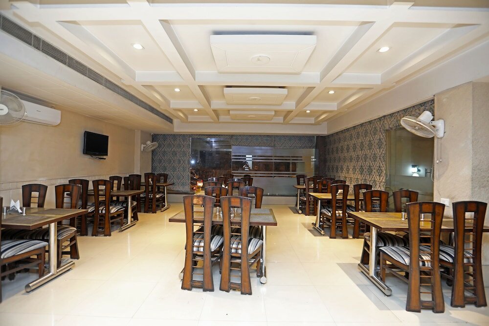 Фото Capital O 445 Impress Hotel