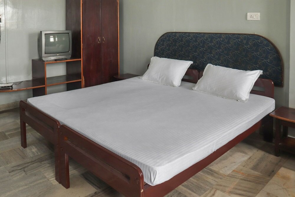 Фото Spot On 49477 Hotel Galaxy