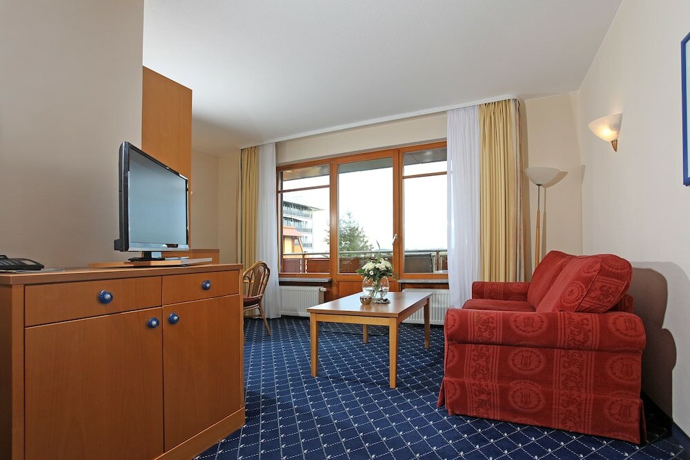 Фото Cliff Wellness Ferienwohnungen Ruegen