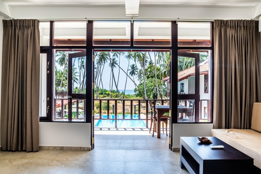 Фото Green Parrot Beach Resort