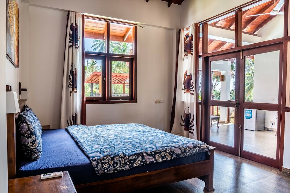 Фото Green Parrot Beach Resort