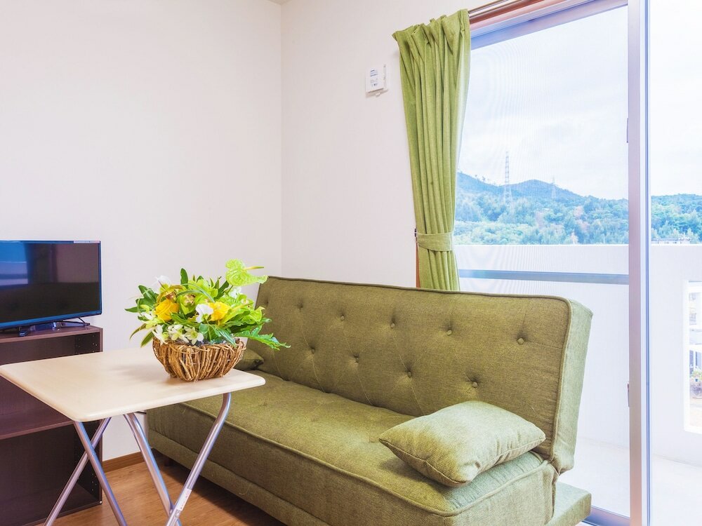 Фото Kariyushi Condominium Resort Kin Yaka Seaside