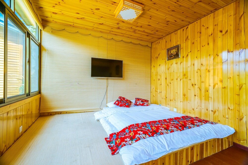 Фото Yijie Holiday Hotel Water GreatWall No. 2