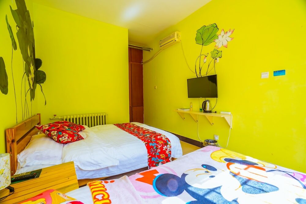 Фото Yijie Holiday Hotel Water GreatWall No. 2