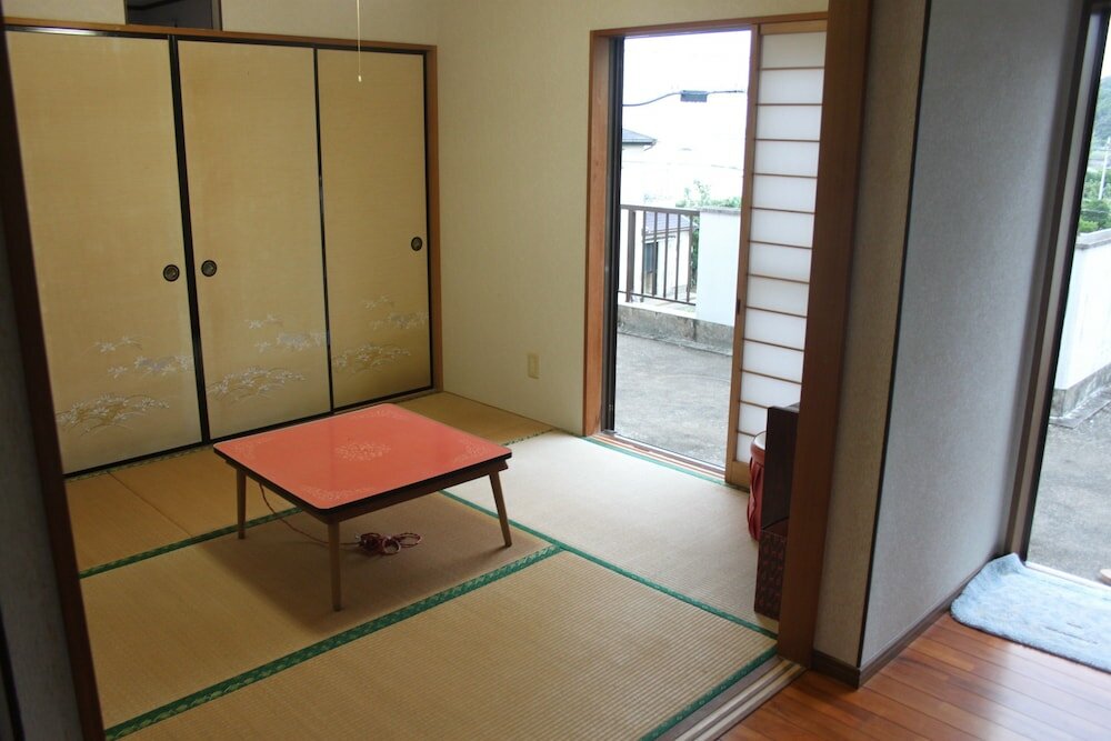 Фото Guesthouse Amami Long Beach