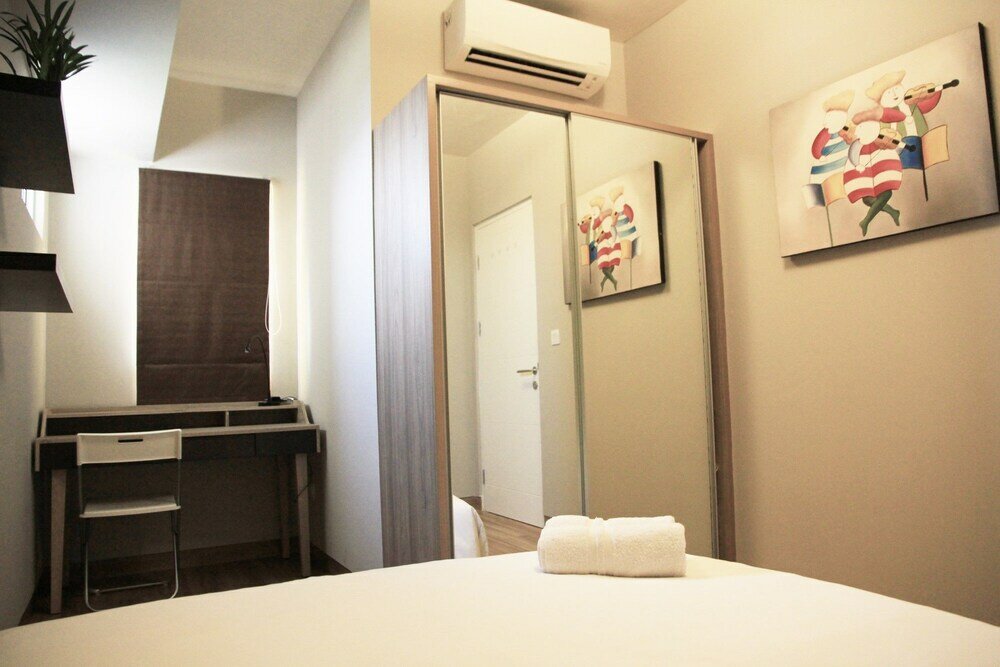 Фото Deluxe and Comfortable The Springlake Summarecon Apartment