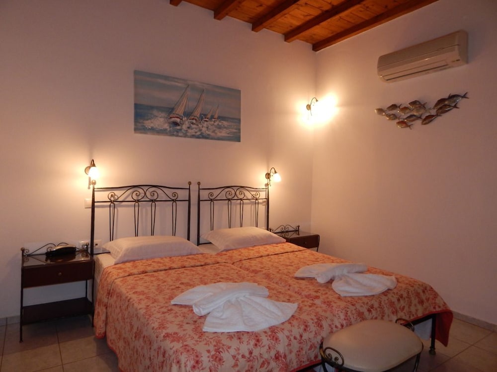 Фото Tinos Suites & Apartments