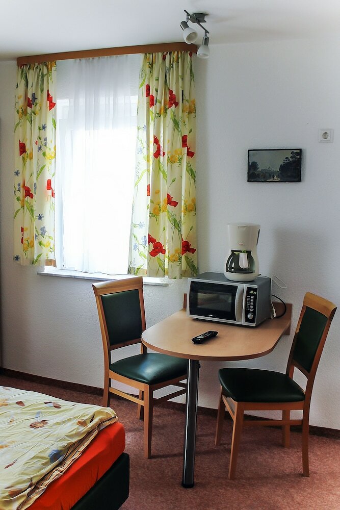 Фото Gästehaus Heigeleshof