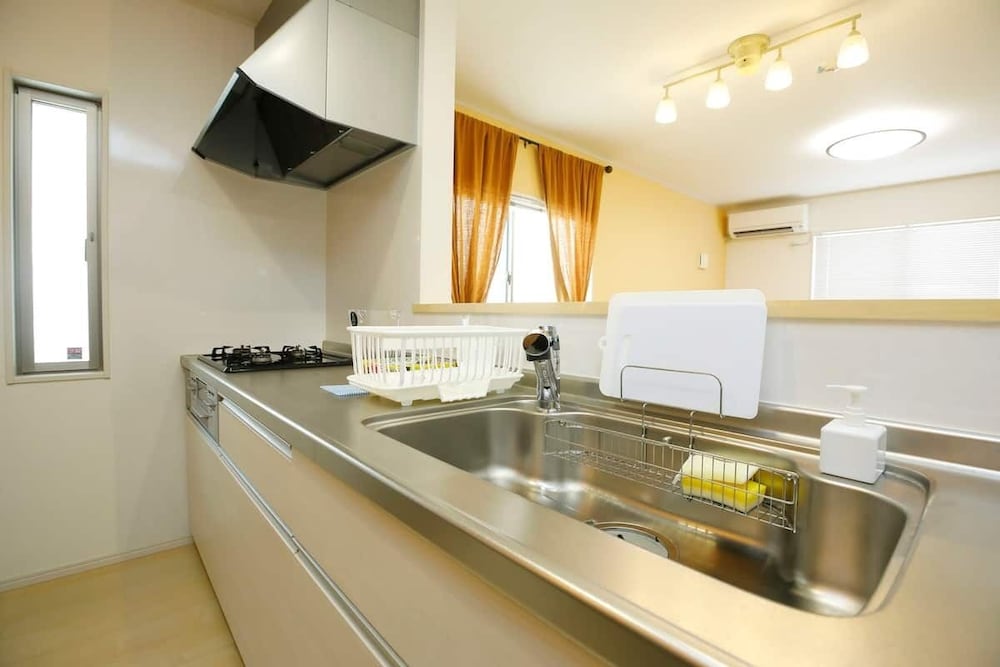 Фото Condomium Motobu Sakura Terrace