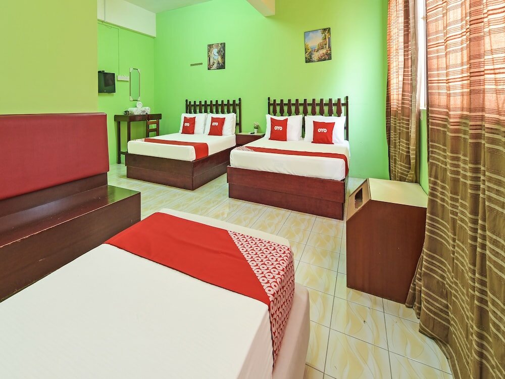 Фото Super Oyo Capital O 90659 Raintown Timbers Hotel