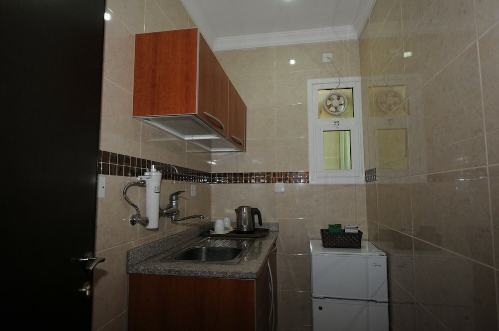 Фото Al Muhanna Plaza Hotel