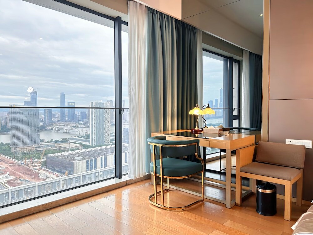 Фото Xingyi International Hotel Poly Store