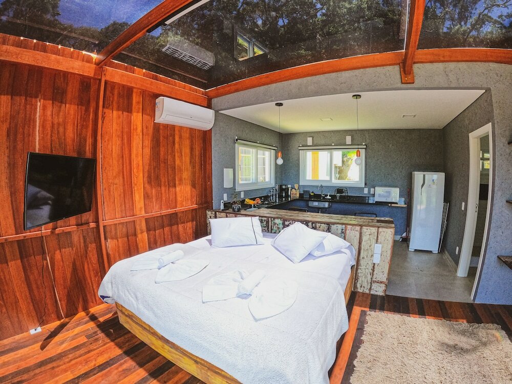 Фото Casa de Vidro - Hospedar com Propósito