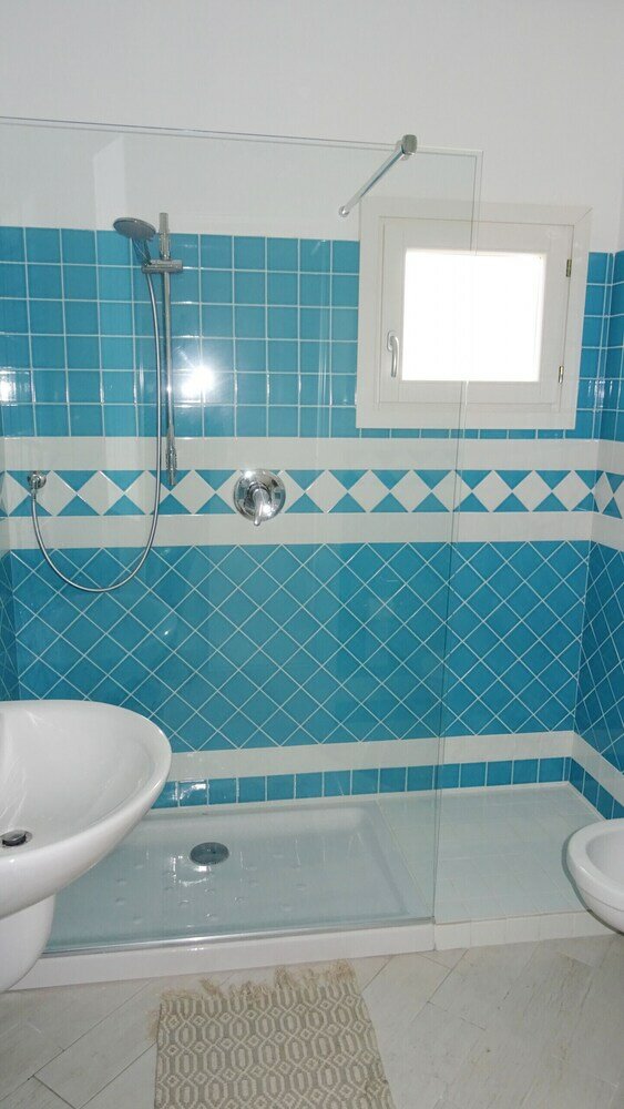 Фото Affittimoderni Isola Rossa Élite - Pati19