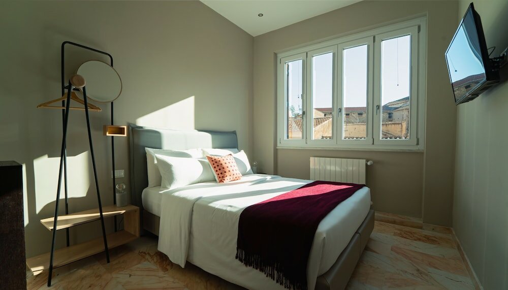 Фото Zefiro Suites