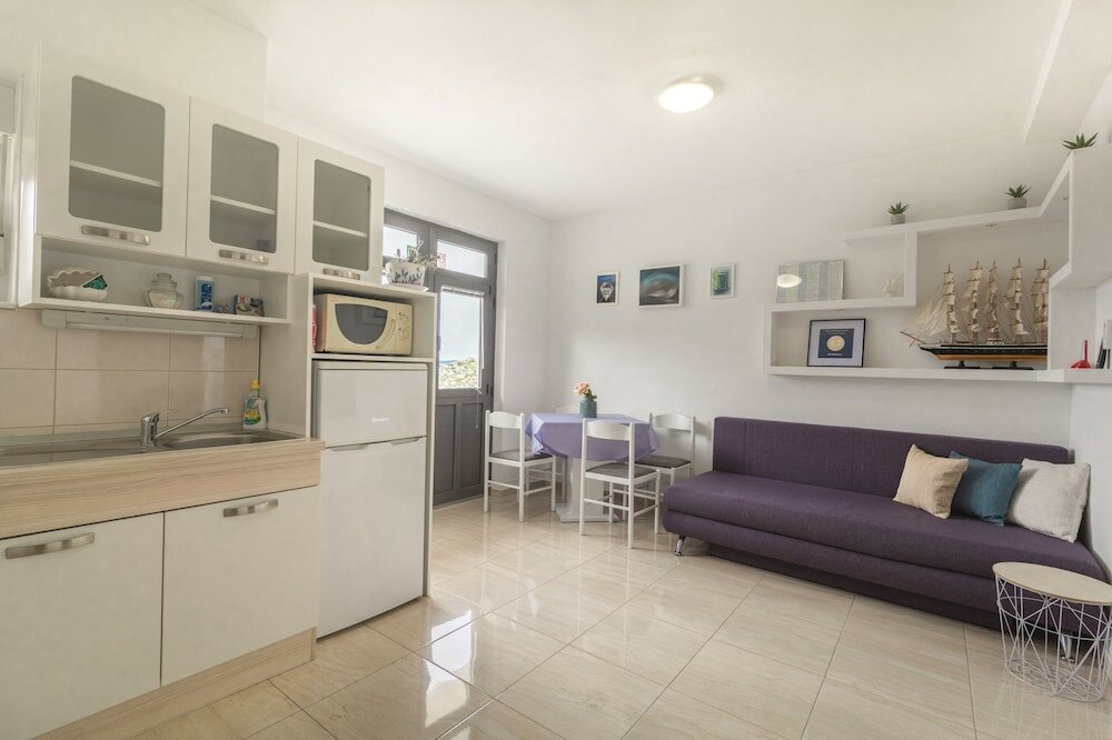 Фото La Storia Apartments