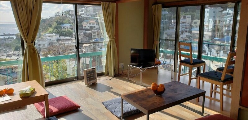 Гостиница Villa Poseidon & 4 Family Room в Вакаяме