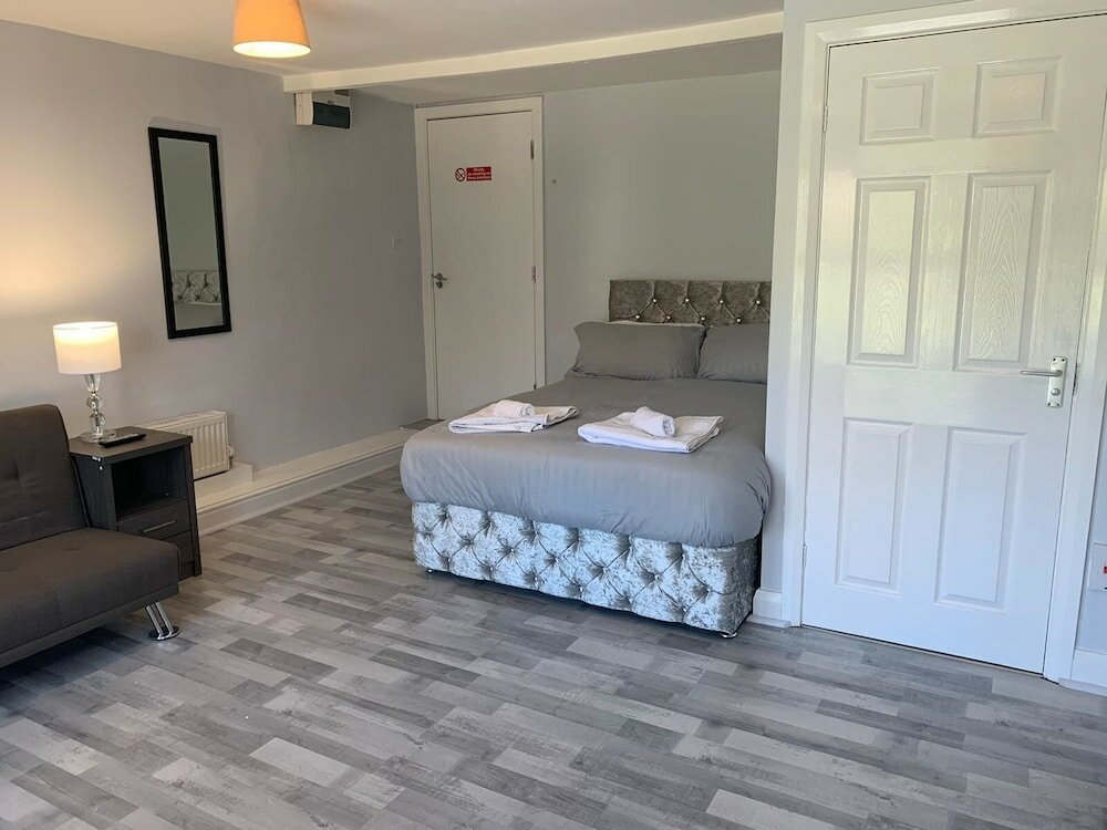 Фото Grey Stone Studio Apartments