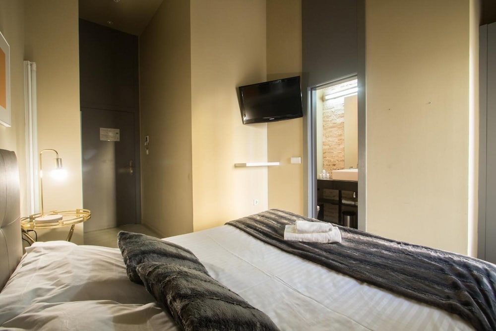 Фото Cosy Rooms Tapinería