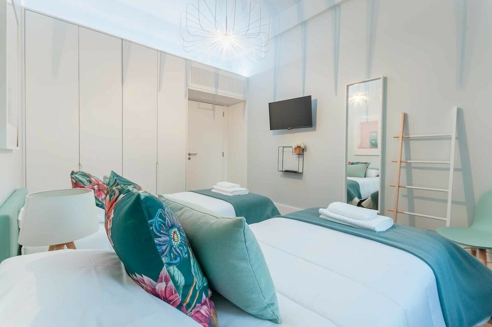 Фото Nlc Rooms & Suites