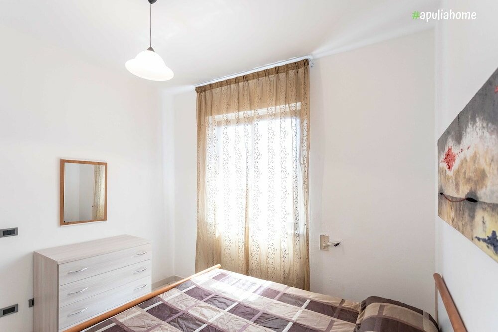 Фото Appartamento White Fronte Mare