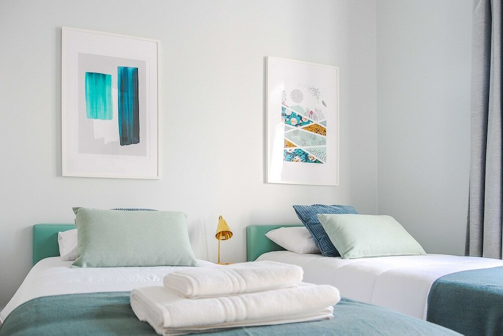 Фото Nlc Rooms & Suites