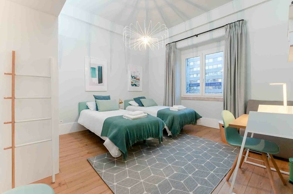 Фото Nlc Rooms & Suites