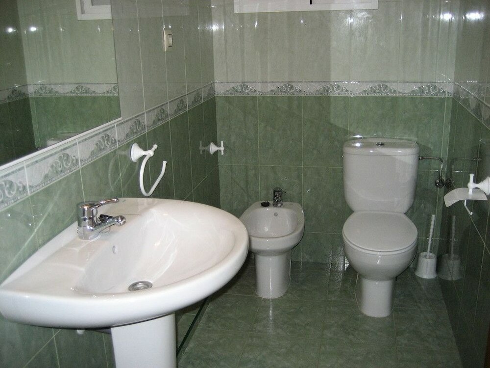 Фото Apartamentos El Oasis