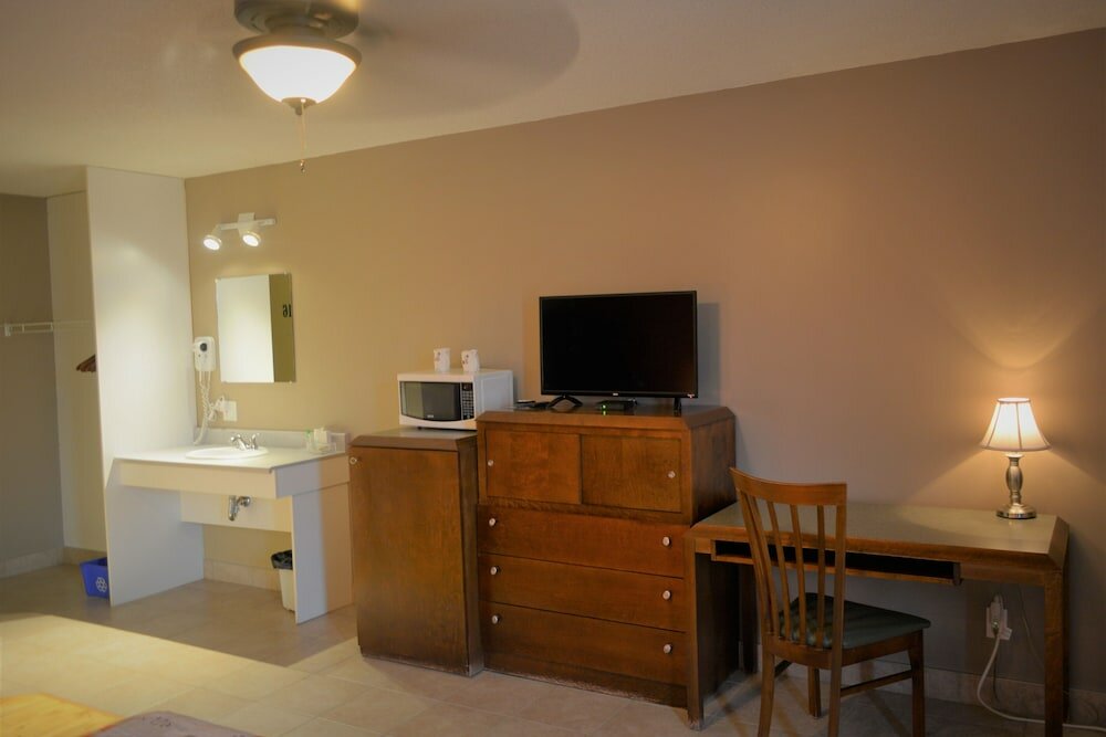 Фото Motel Quatre Saisons