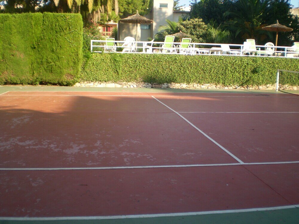 Фото Apartamentos El Oasis