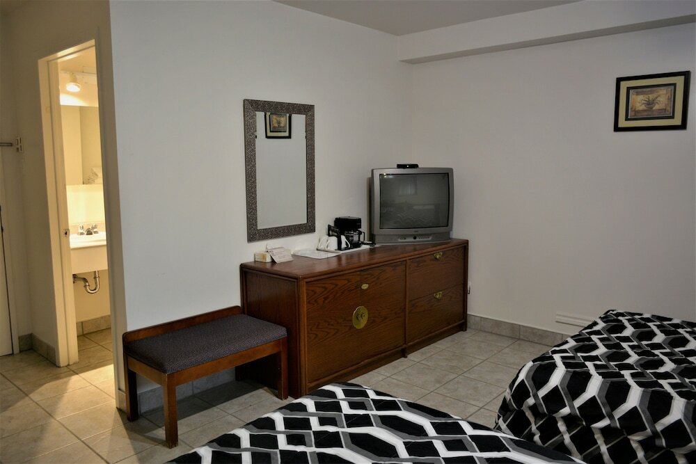 Фото Motel Quatre Saisons